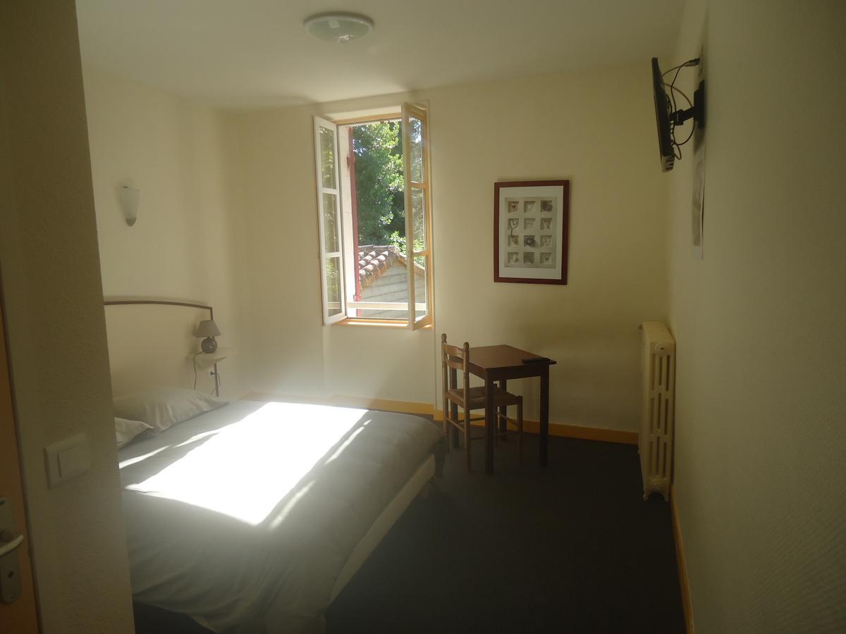 Logis Hotel Du Champ De Foire Saint-Aulaye-Puymangou Eksteriør billede